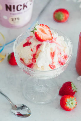 Healthy Vanilla Ice cream with Strawberry sauce no added sugar.